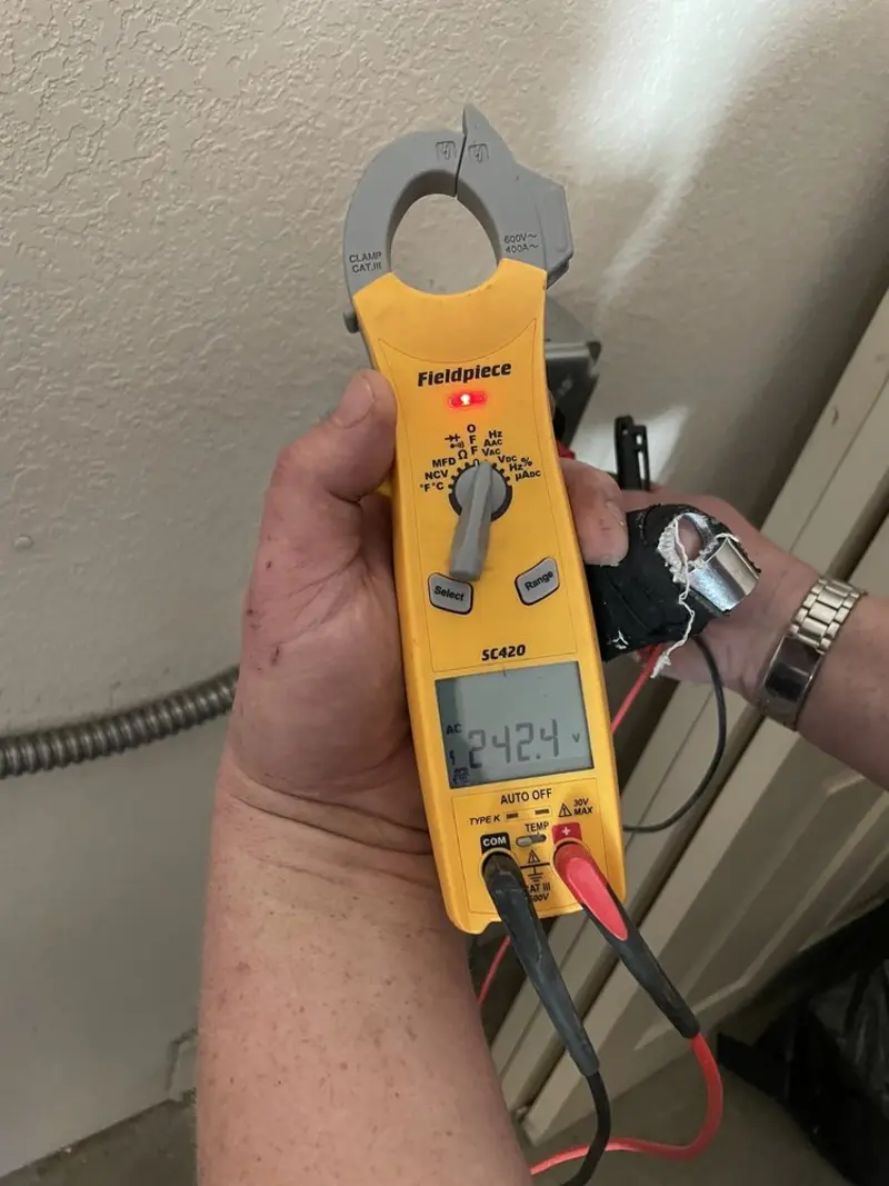 Voltage testing with clamp meter during Aluminum Wiring Replacement in Thornapple